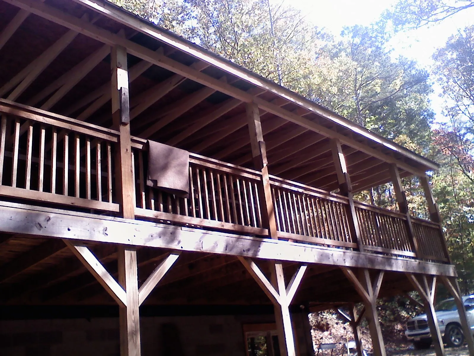 Timber framing under a new elevated porch and deck — Roof Leak Repair in Hawkeye by Roofing Brothers